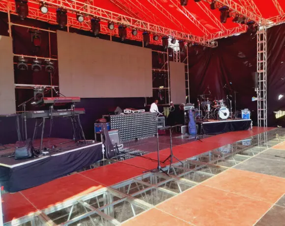 Artist support and stage equipment setup for live performers in Kenya