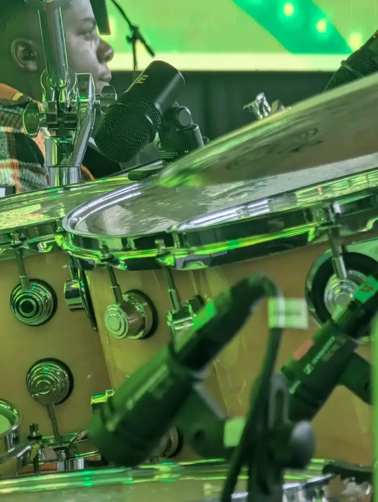 Close view of drum microphones clipped to the toms and snare of the house kit at Rhema Feast 2026 in Kenya